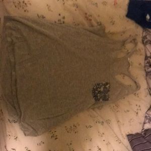 Grey tank with flower pocket. Size Medium